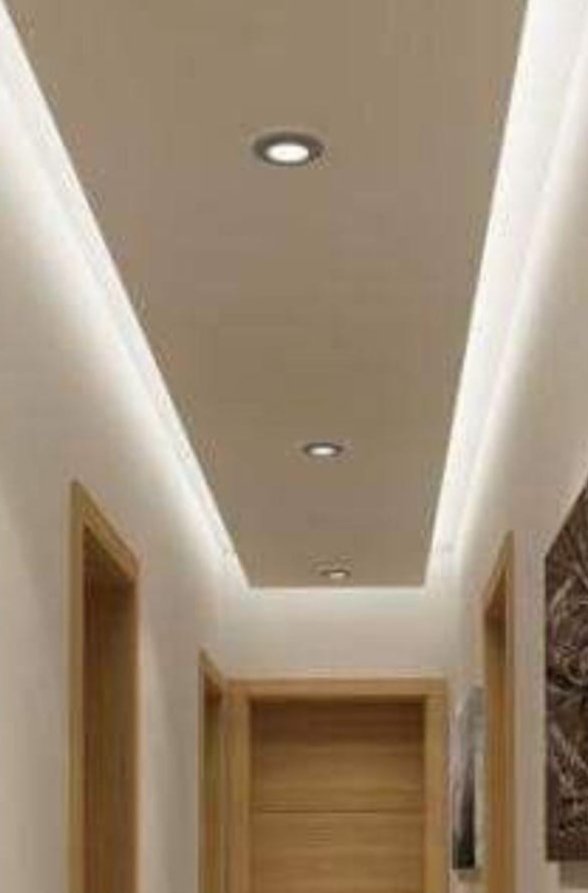 Dropped hallway ceiling with cove lighting on both sides